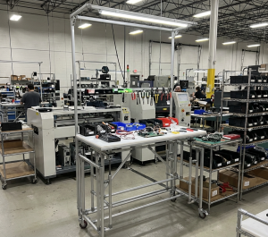 Height adjustable modular workstation for lean manufacturing made from AluPro